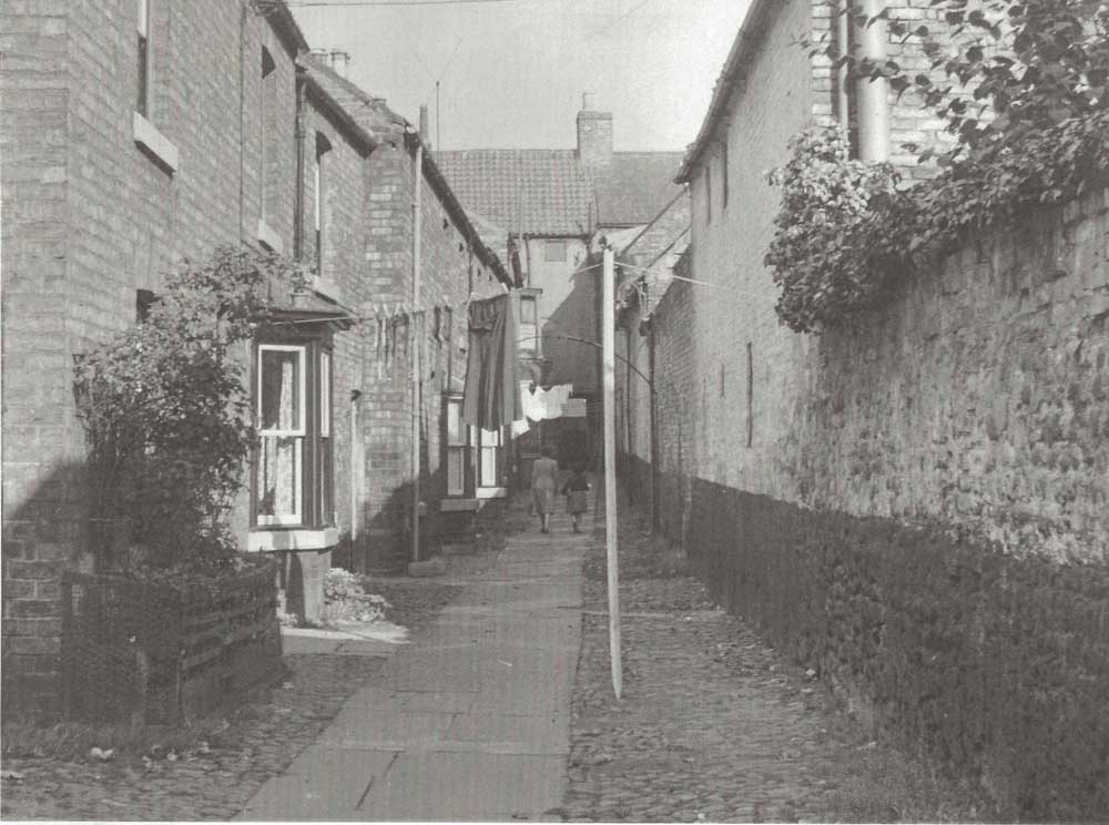 View of Market Row, later Barkers Arcade, one of the Yards off Applegarth, prior to demolition